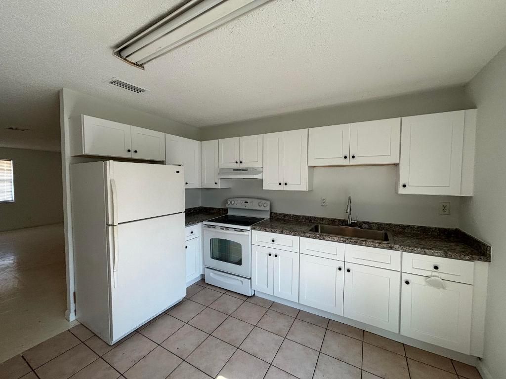 Photo of 4790 Chariot Circle, Greenacres, FL 33463 (MLS # R11158095)