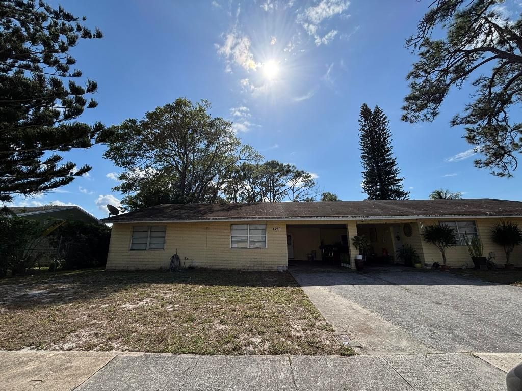 Photo of 4790 Chariot Circle, Greenacres, FL 33463 (MLS # R11158095)