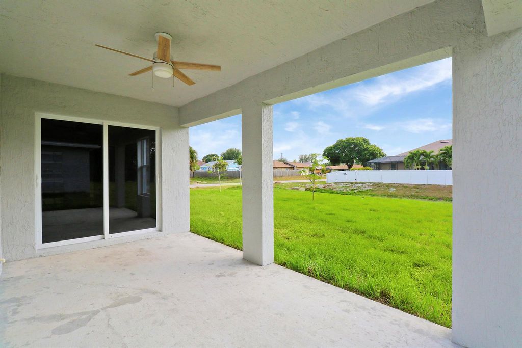 Photo of 2498 SW Bayshore Boulevard, Port Saint Lucie, FL 34984 (MLS # R10979899)