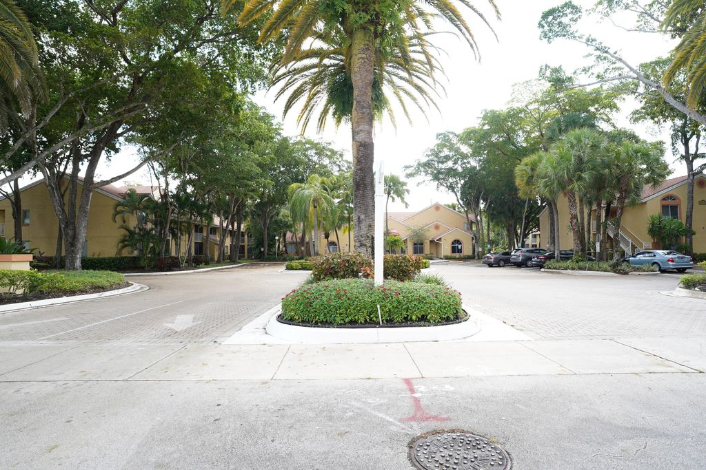 Photo of 1015 Coral Club Drive #1015, Coral Springs, FL 33071 (MLS # R11160437)