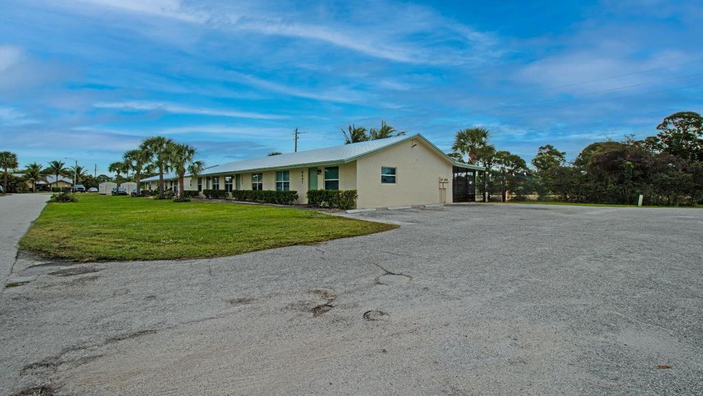Photo of 8693 SE Hobe Ridge Avenue, Hobe Sound, FL 33455 (MLS # R10938823)