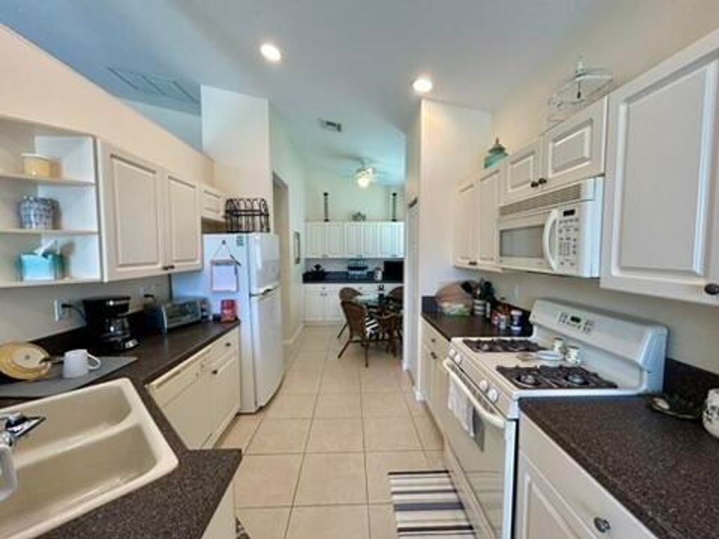 Photo of 360 NW Shoreline Circle, Port Saint Lucie, FL 34986 (MLS # B26023142)