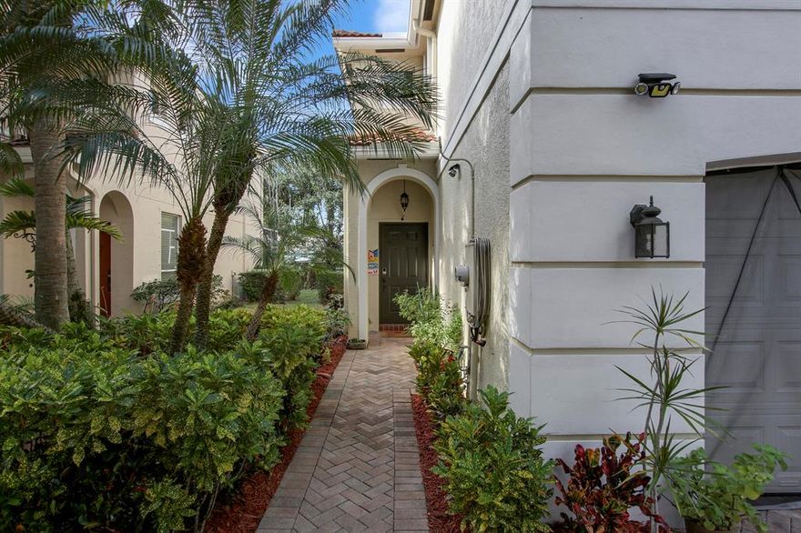 WOW....LOCATION LOCATION. Rarely available and highly sought after SPACIOUS RENTAL in a gated community (unmanned).  OPEN FLOOR PLAN! Smart home features include Ecobee Thermostat, Smart lights (connected through Alexa). New SS appliances, Pantry, Brazilian Cherry Wood Floor in Living Area, foyer w/custom built-in, large screened in patio perfect to grill, Sizeable primary bedroom suite w/tray ceilings, expansive bath and huge walk in closet, upstairs loft fits desk, washer/dryer in big laundry rm w/extra storage space. 2 CAR GARAGE, Community POOL, sidewalks and street lights.   Minutes to I-95, restuarants, shopping, our world class golf courses. 15 min to PBI and the turquoise blue waters of our BEACHES.  Personal TRUCKS ALLOWED (up to 1 ton). Accordian Shutters.  Family Friendly.