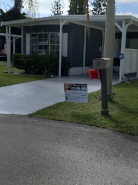 Photo of 22 Cozumel Lane, Port Saint Lucie, FL 34952 (MLS # B26025997)