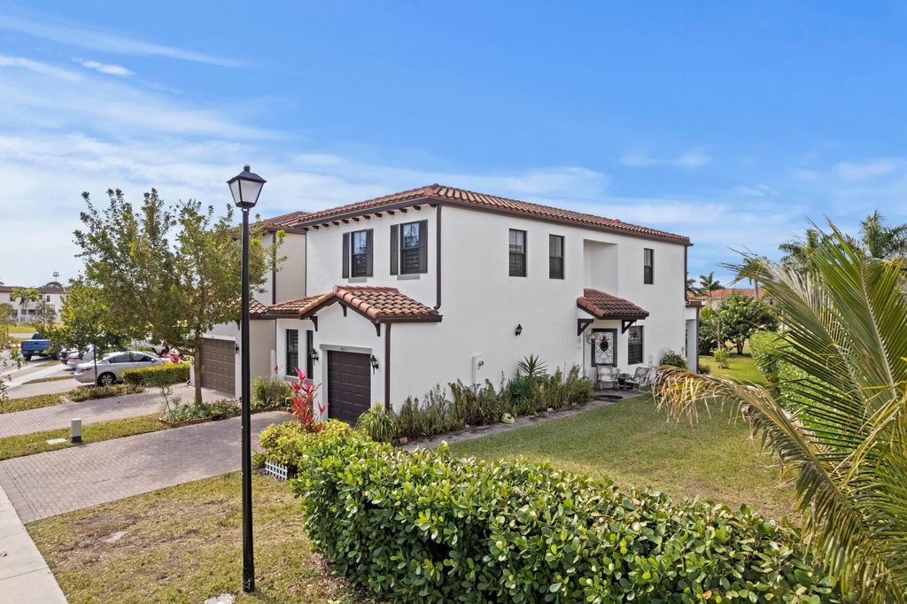 Photo of 4021 Sycamore Cove, Riviera Beach, FL 33410 (MLS # R11169990)