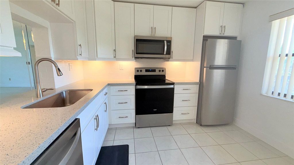 Photo of 2900 NW 42nd Avenue #A401, Coconut Creek, FL 33066 (MLS # F10504543)