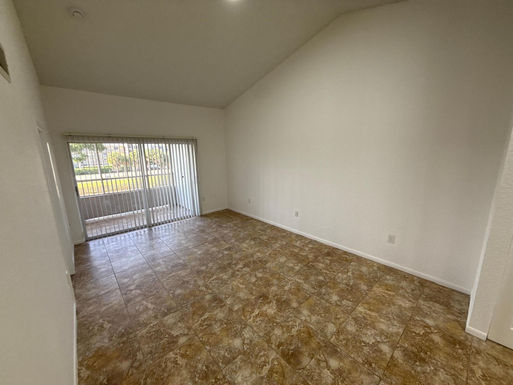 Photo of 2851 N Oakland Forest Drive #307, Oakland Park, FL 33309 (MLS # B26026830)
