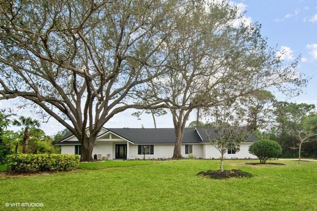 Photo of 7680 Wyldwood Way, Port Saint Lucie, FL 34986 (MLS # R10867150)