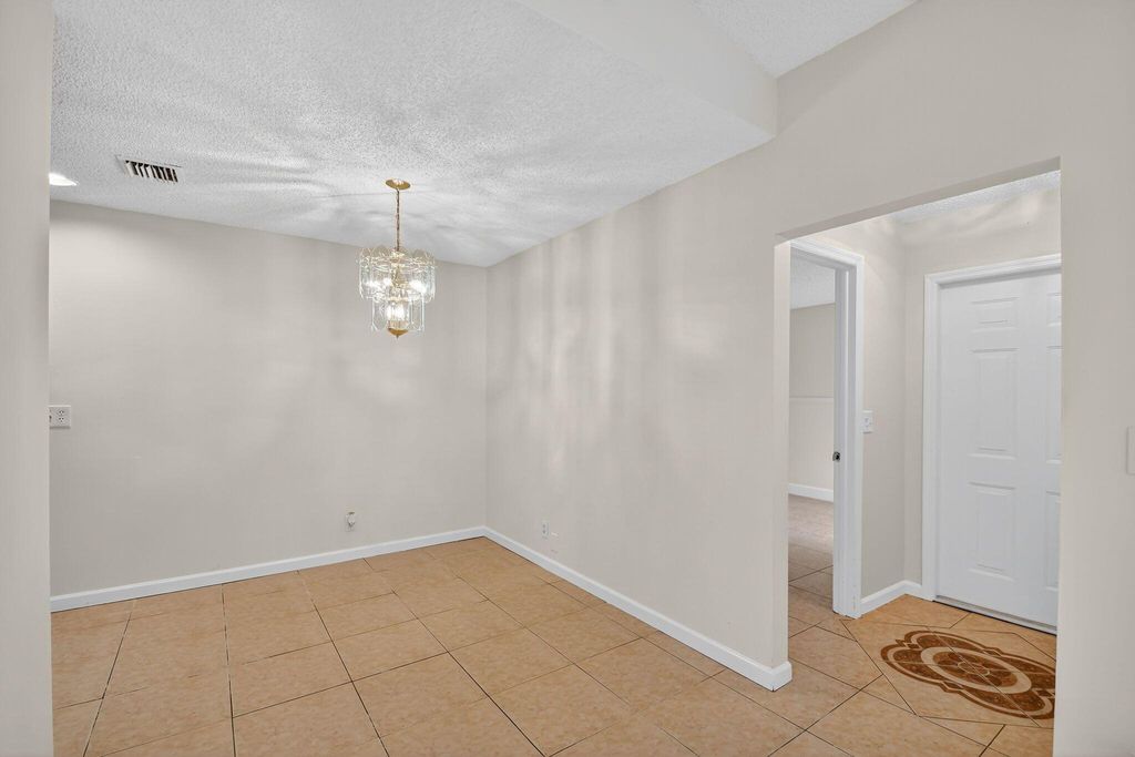 Photo of 2701 Waterview Circle, Palm Springs, FL 33461 (MLS # R11114490)