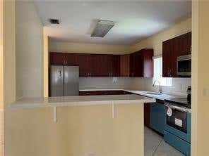 Photo of 7612 NW 99TH Terrace, Tamarac, FL 33321 (MLS # B26064063)