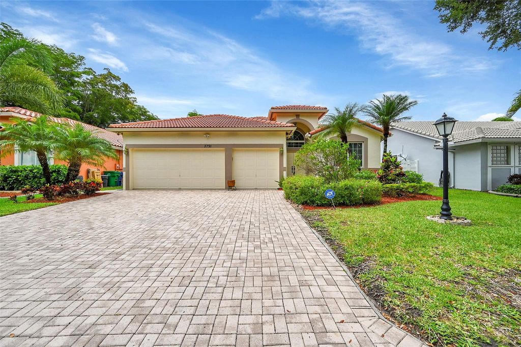 Photo of 5791 NW 48th Drive, Coral Springs, FL 33067 (MLS # F10531779)