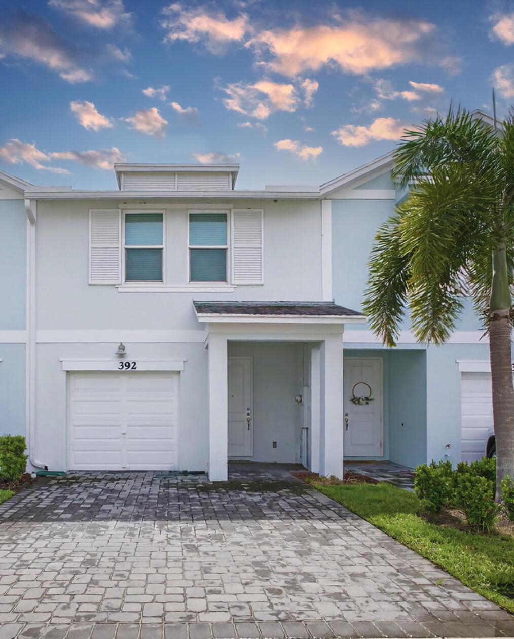 Welcome to the 2021-built community of Seaside, one of Stuart's most desirable newer neighborhoods. This beautifully maintained ''Pompano'' model townhouse features a bright, open-concept layout with 1,475 sq ft of living space, three bedrooms upstairs, 2.5 bathrooms, a versatile loft area, a 1-car garage with extra parking, and a fabulous open-air patio perfect for outdoor relaxation.Built with durable concrete block construction and full impact windows and doors throughout, this energy-efficient home showcases stainless steel appliances, granite countertops, 42'' white cabinetry, a large kitchen island, and modern finishes for stylish everyday living.