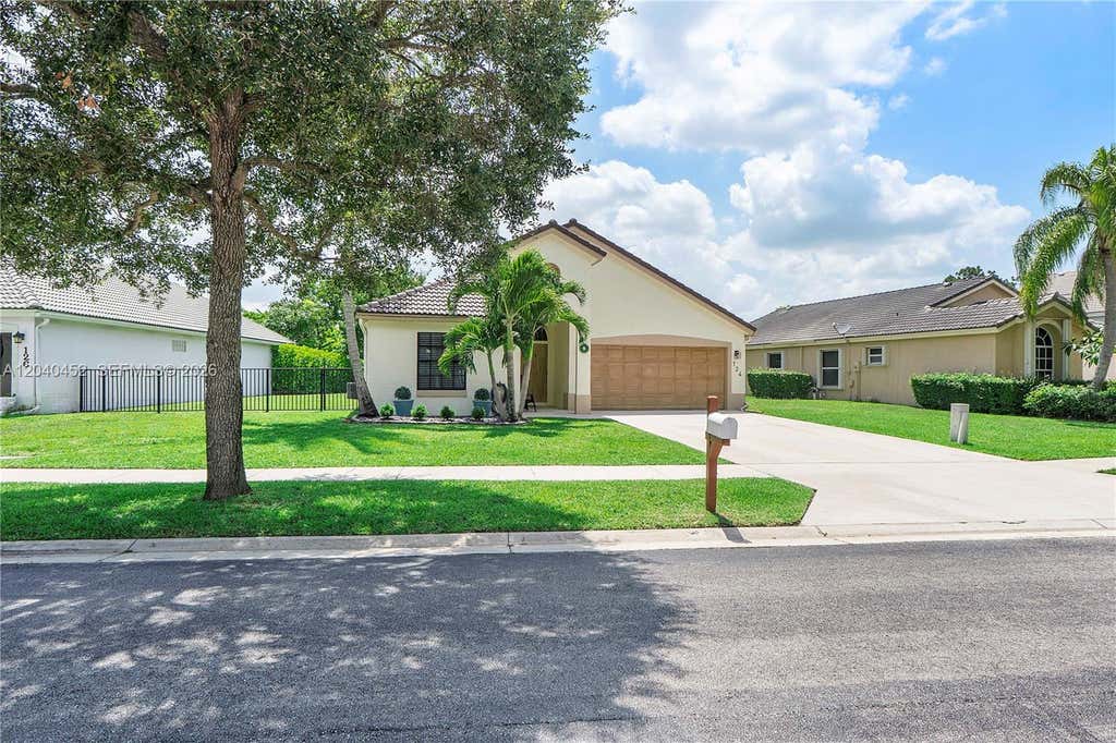 Photo of 124 Preserve Drive, Royal Palm Beach, FL 33411 (MLS # A12040452)