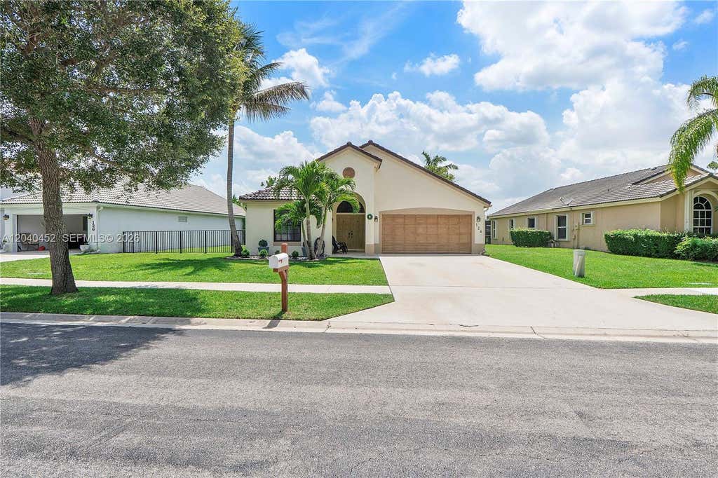 Photo of 124 Preserve Drive, Royal Palm Beach, FL 33411 (MLS # A12040452)