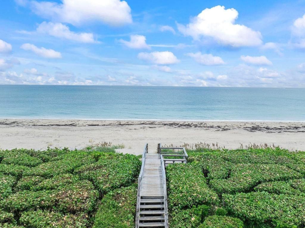 Photo of 9 Sailfish Lane #A, Ocean Ridge, FL 33435 (MLS # R11011316)