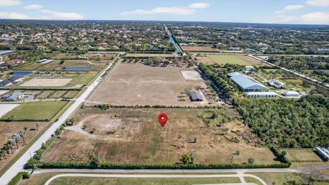 Photo of 16296 Deer Path Lane, Wellington, FL 33470 (MLS # R11162963)