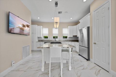 Tiny photo for 208 Glacier Street, Palm Beach Gardens, FL 33410 (MLS # B26036735)