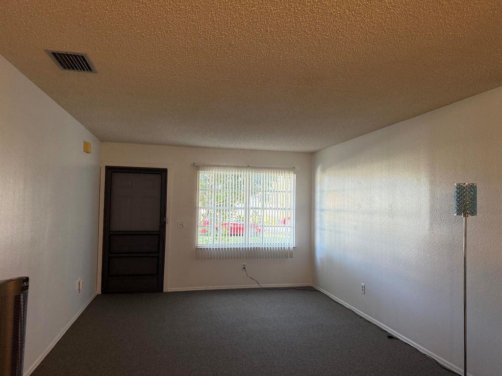 Photo of 2292 SE Berkshire Boulevard, Port Saint Lucie, FL 34952 (MLS # R11043548)