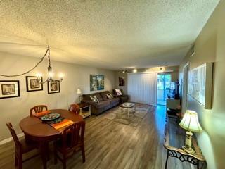 Photo of 553 COVERED BRIDGE Boulevard, Lake Worth, FL 33467 (MLS # B26087234)