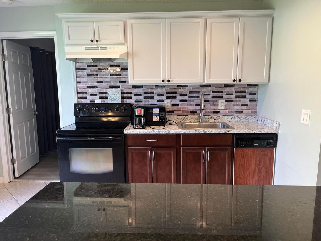 Photo of 491 SW Curtis Street, Port Saint Lucie, FL 34983 (MLS # B26010608)