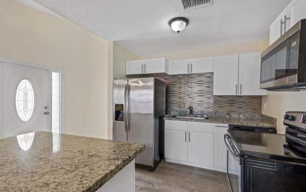 Photo of 1221 The 12th Fairway, Wellington, FL 33414 (MLS # R10740730)