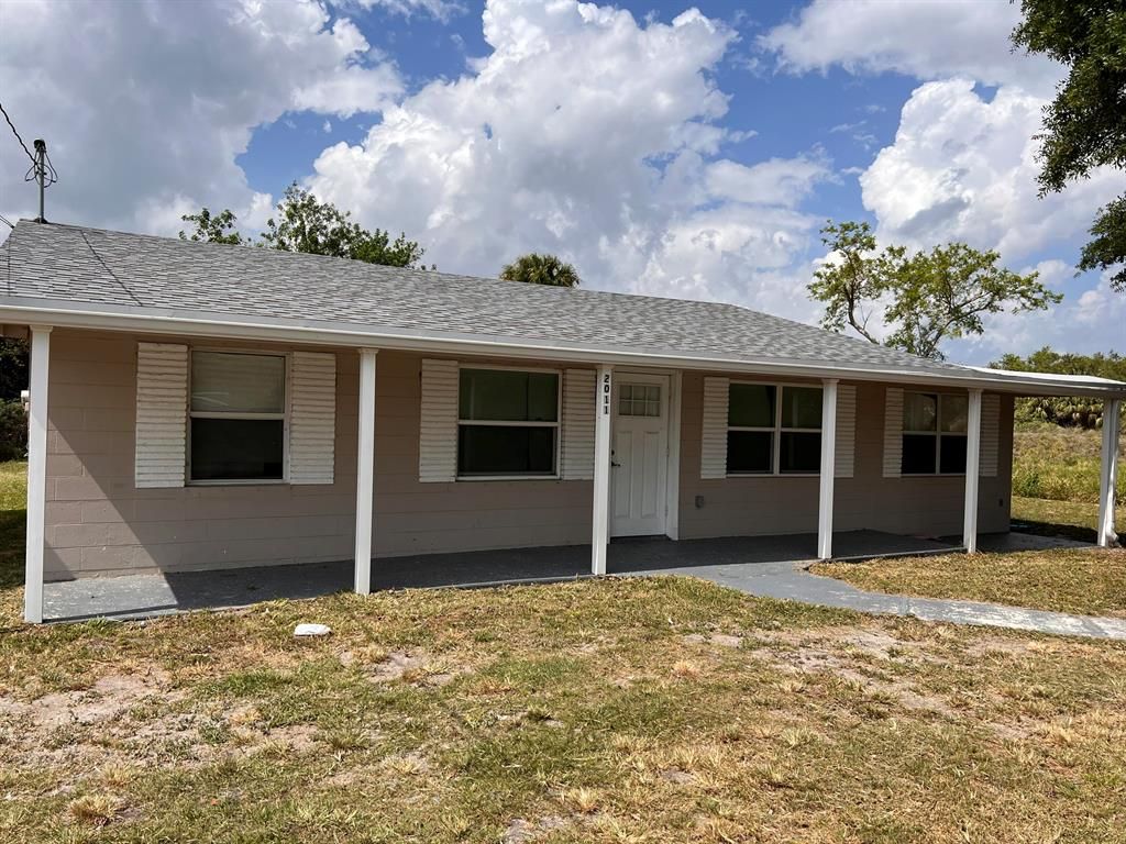 Photo of 2011 N 51st Court, Fort Pierce, FL 34947 (MLS # R10872872)