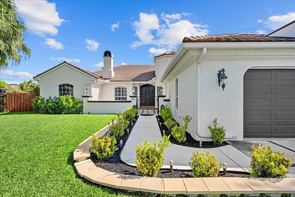 Photo of 404 Indigo Avenue, Wellington, FL 33414 (MLS # R10979680)