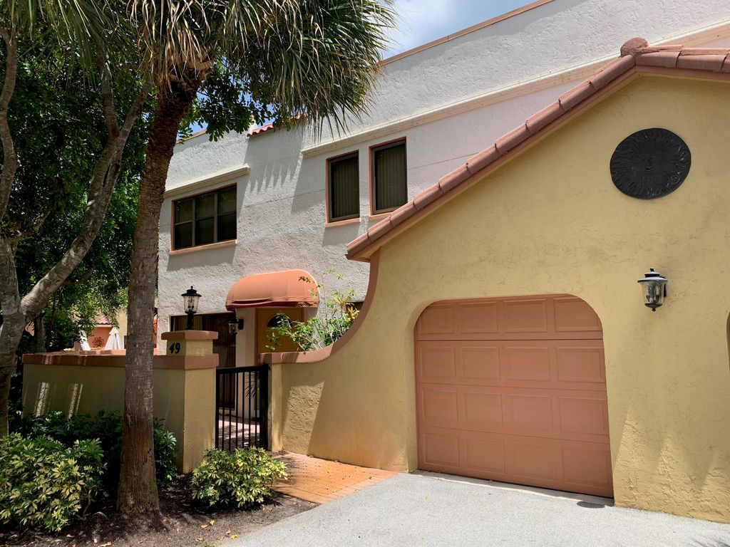 Photo of 49 Uno Lago Drive, Juno Beach, FL 33408 (MLS # R11147467)