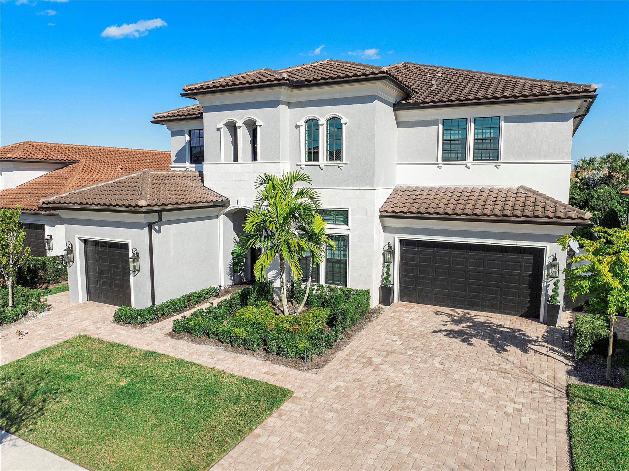 Indulge in the epitome of luxury living at this magnificent 2 story home nestled in the affluent city of Parkland. This residence exudes opulence at every turn. A haven for entertainment, the backyard boasts a saltwater pool and spa, complemented by an outdoor kitchen and fire pit, offering a seamless blend of sophistication and relaxation. Step inside to discover a sanctuary of modern elegance, with upgrades gracing every corner. The gourmet kitchen is a culinary masterpiece while the primary suite is a retreat of its own, offering serenity and indulgence. This exclusive community provides access to a state-of-the-art clubhouse, featuring a beach-entry pool, fitness center, culinary kitchen, and a kids' club. The epitome of refined living awaits, where luxury meets lifestyle seamlessly.