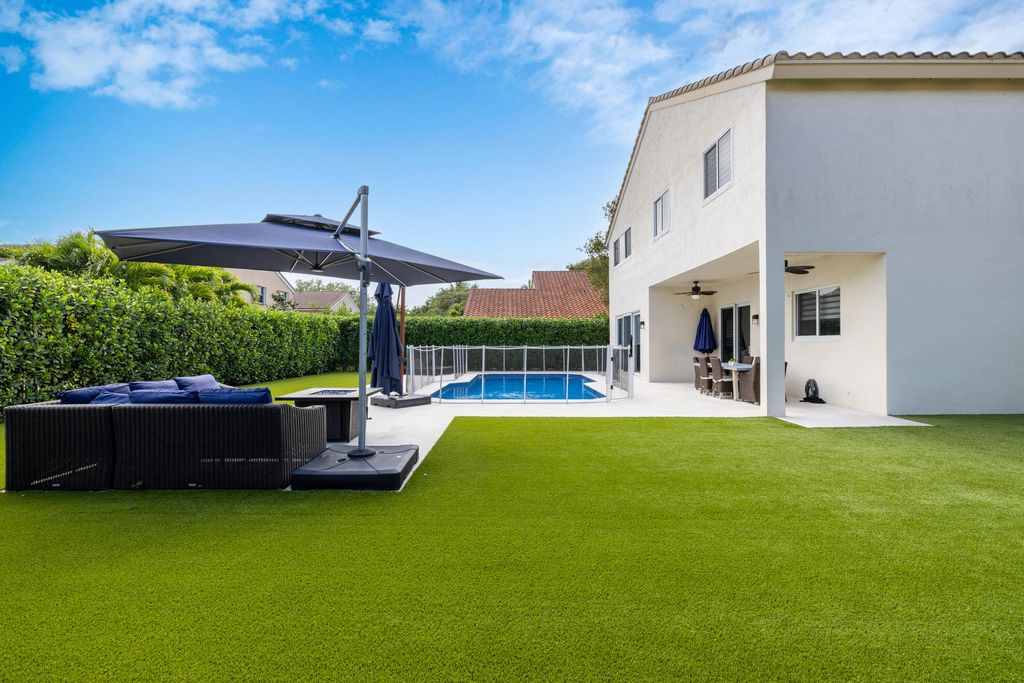 Photo of 7380 NW 68th Way, Parkland, FL 33067 (MLS # B26012587)