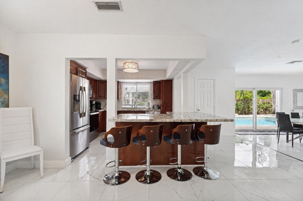 Photo of 1243 GARFIELD Street, Hollywood, FL 33019 (MLS # B26053445)