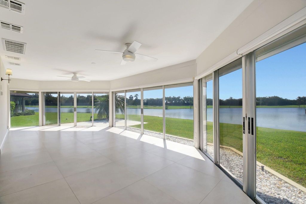 Photo of 330 Cedar Key Circle, Atlantis, FL 33462 (MLS # R11048917)