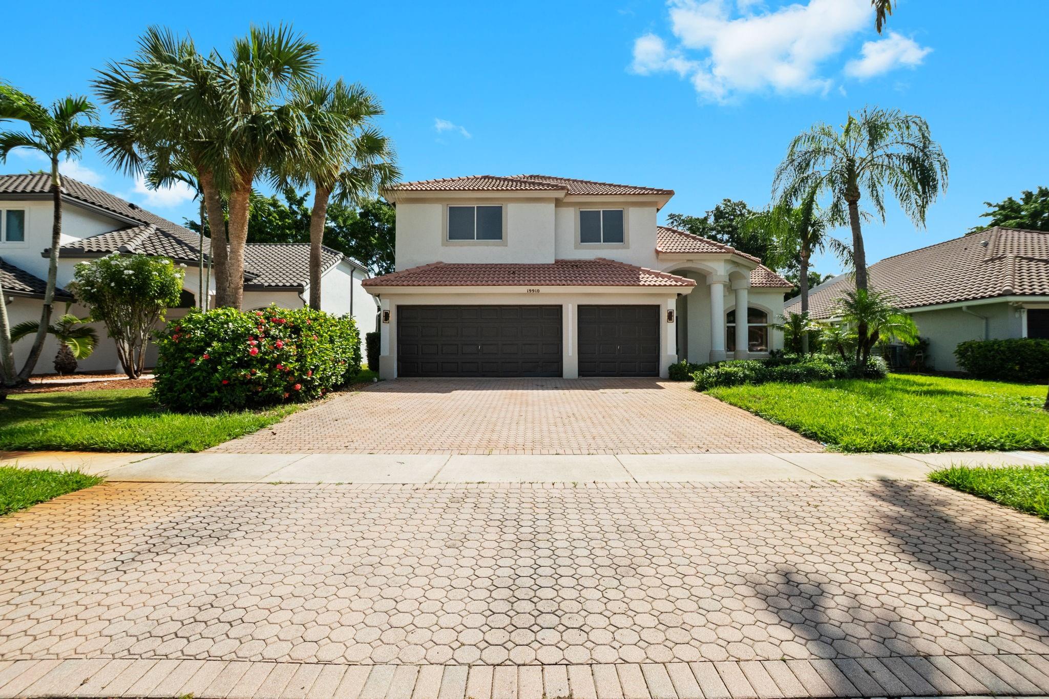 Welcome to the luxurious guard gated community of Boca Isles South surrounded by excellent schools. The community features a newly renovated clubhouse with state of the art gym, resort pool, playgrounds, tennis and basketball. It offers a lifestyle to behold. 19910 is one of the most spacious models available with 2934 sq ft. There are 4 beds/3 baths and separate living, dining and family rooms all centered around the recently updated kitchen with newer appliances. One bed/bath is located on the 1st floor with 3 more upstairs including the massive primary with balcony. The home was recently painted, has a 3 car garage, updated baths, newer flooring and huge screened pool and patio. The location is ideal with easy access to major highways and plenty of nearby shopping and dining.