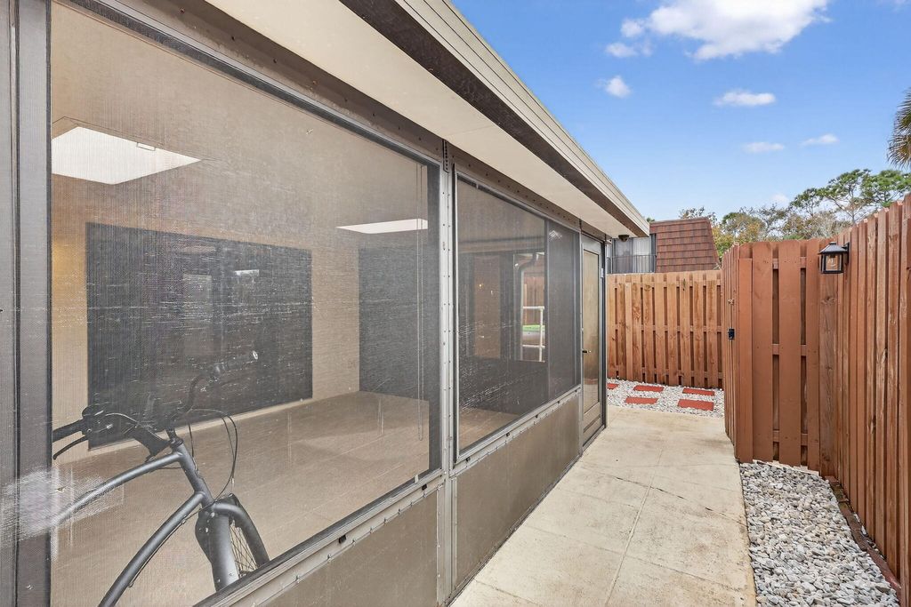 Photo of 5612 SE Riverboat Drive #104, Stuart, FL 34997 (MLS # R11158032)