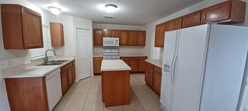 Photo of 1349 SE Floresta Drive, Port Saint Lucie, FL 34983 (MLS # F10393764)