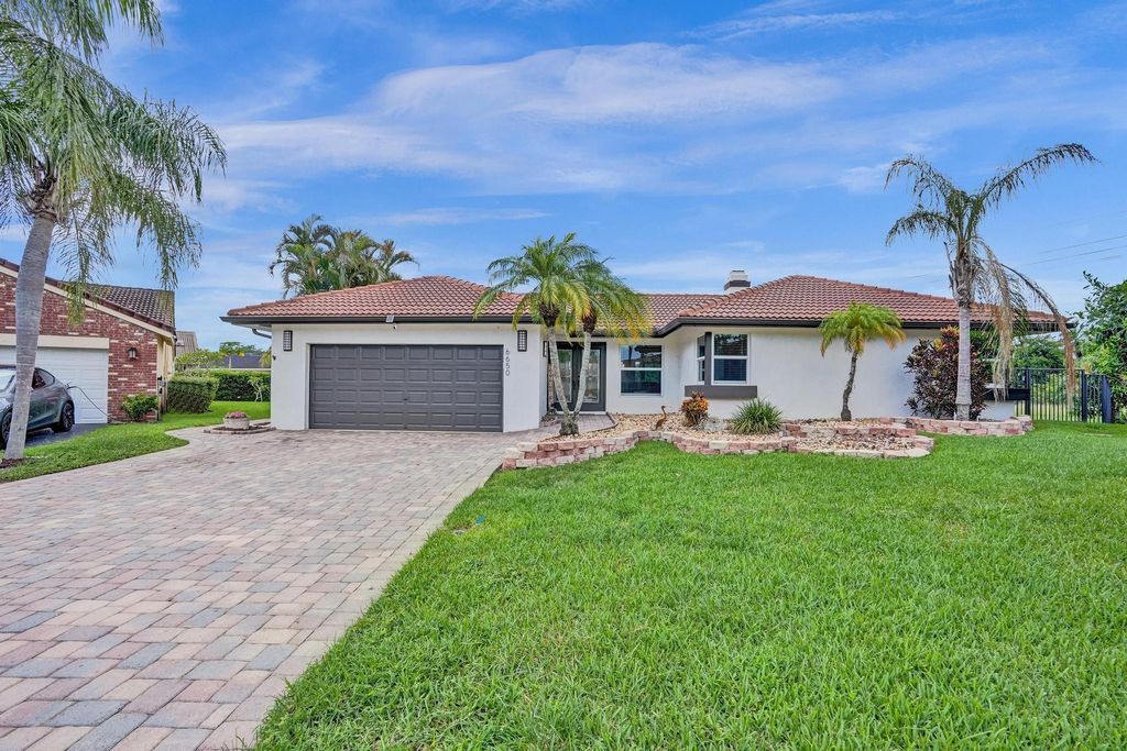Photo of 6650 NW 47th Street, Coral Springs, FL 33067 (MLS # F10515043)