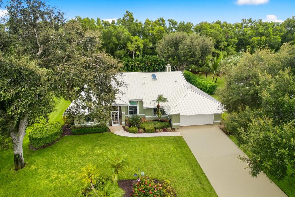 Photo of 737 SW Wood Creek Drive, Palm City, FL 34990 (MLS # R11124225)