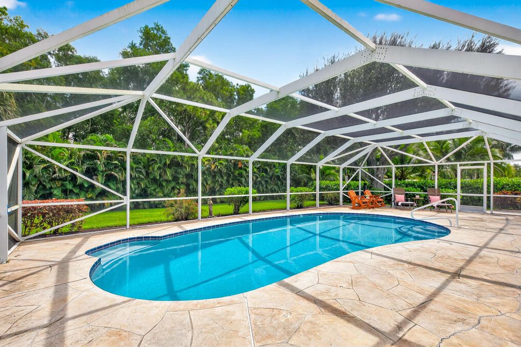 Photo of 737 SW Wood Creek Drive, Palm City, FL 34990 (MLS # R11124225)