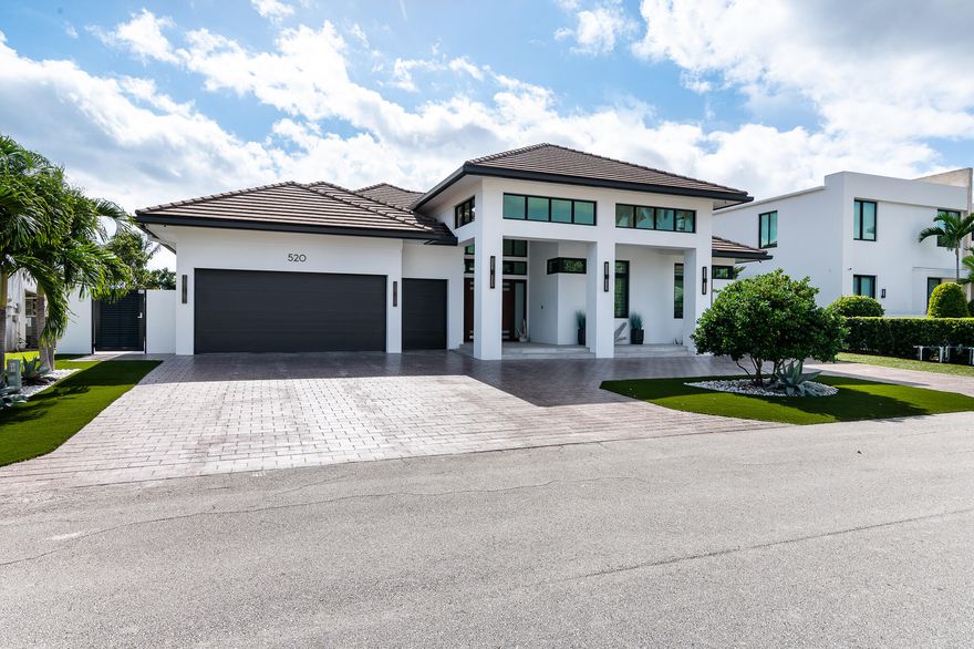 With desired southern exposure, this single-story home is located on a deep-water canal in the established neighborhood of Golden Harbour--walking distance to Mizner restaurants, Fifth Avenue shops and the best beaches in Boca Raton. This property is a boater's paradise with 85-feet of waterfront, including a 75-foot dock with 20,000-lbs elevator boat lift. Custom built and immaculately maintained, this residence features indoor and outdoor living at its best!  Designed to be maintenance free (by a yachting couple that spends months away from home), it includes Turf grass, 1-touch remote control hurricane screens, custom impact glass and doors, a summer kitchen, and private backyard.