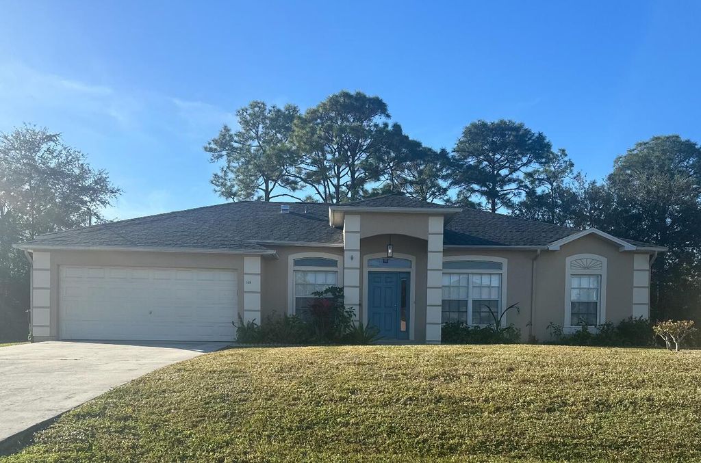 Photo of 158 SW Essex Drive, Port Saint Lucie, FL 34984 (MLS # R11042681)