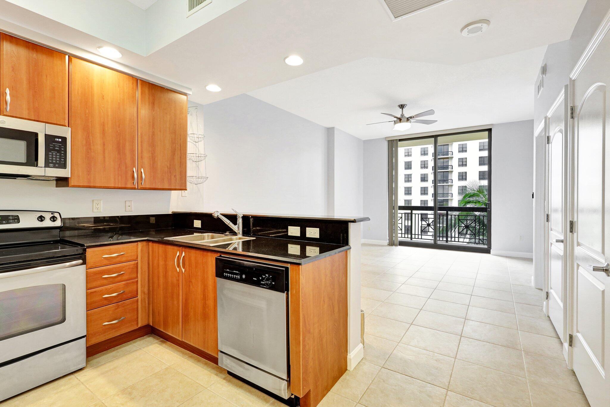 Fantastic One City Plaza Luxury Condo ANNUAL RENTAL! Offering One Bedroom & 1.5 baths w/ 876 s.f. of Downtown West Palm Beach Luxury Living! FRESHLY PAINTED, WITH NEW A/C. Kitchen features Granite and SS appliances. NORTH WEST EXPOSURE WITH LOTS OF NATURAL LIGHT! Assigned garage Parking and Storage included. Enjoy the rooftop Resort Pool/Spa, Valet Parking, 24 hour staffed Lobby. 5 Star Amenities! The Rooftop Resort Pool/Spa offers Panoramic Views of Intracoastal, Ocean and Palm Beach Island. A Full Service Building, and less than 10 minutes from Palm Beach International Airport. 100% Walkability STROLL TO CITY PLACE, RESTAURANTS, MUSEUMS AND SHOPPING!