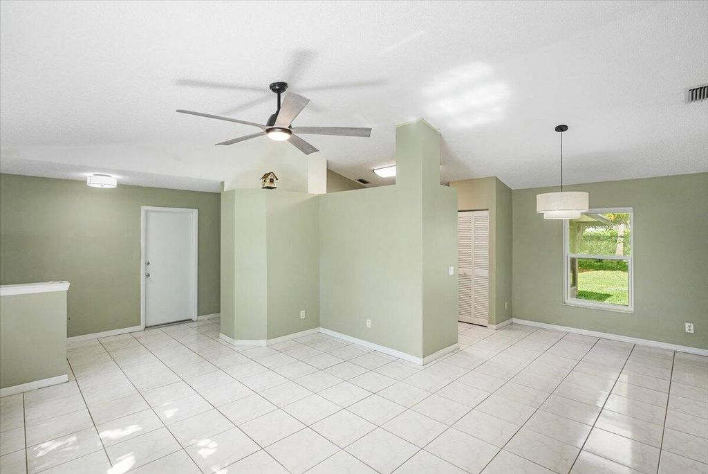 Photo of 2014 SE Parrot Street, Port Saint Lucie, FL 34952 (MLS # R11001600)