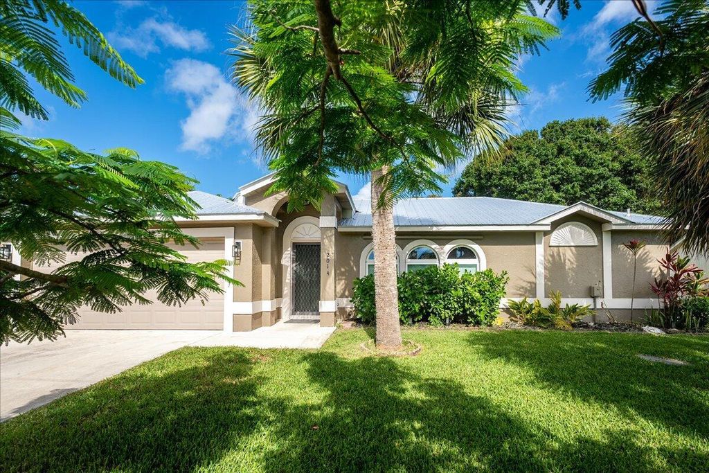 Photo of 2014 SE Parrot Street, Port Saint Lucie, FL 34952 (MLS # R11001600)