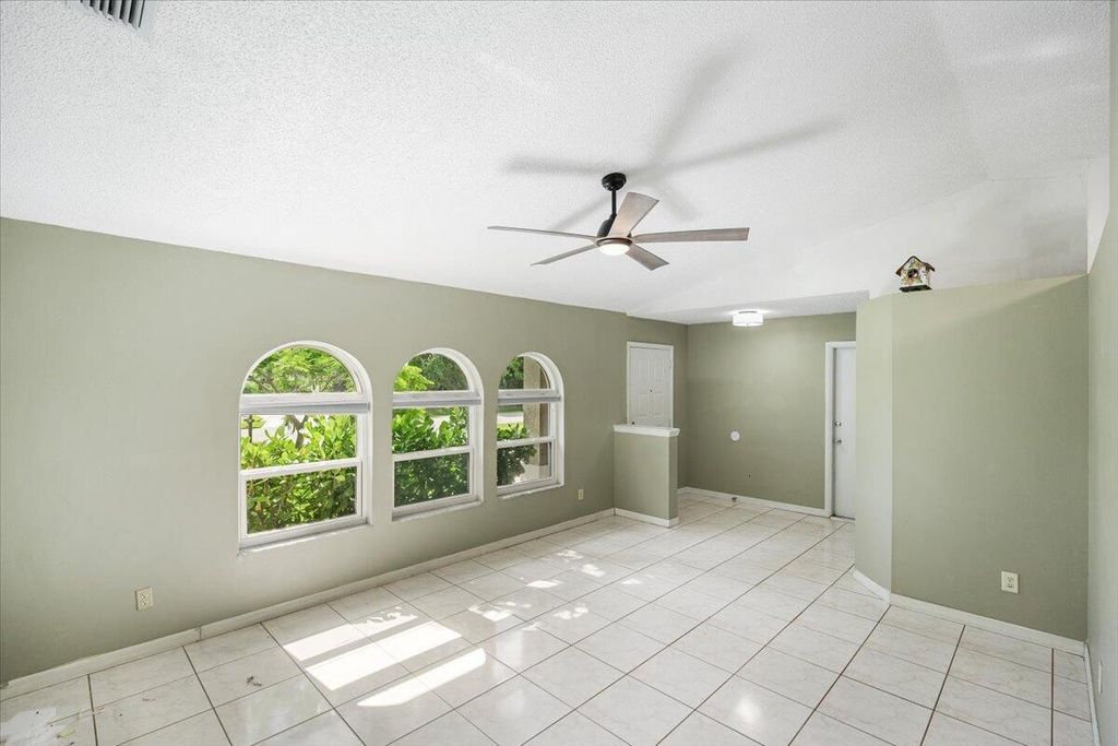 Photo of 2014 SE Parrot Street, Port Saint Lucie, FL 34952 (MLS # R11001600)