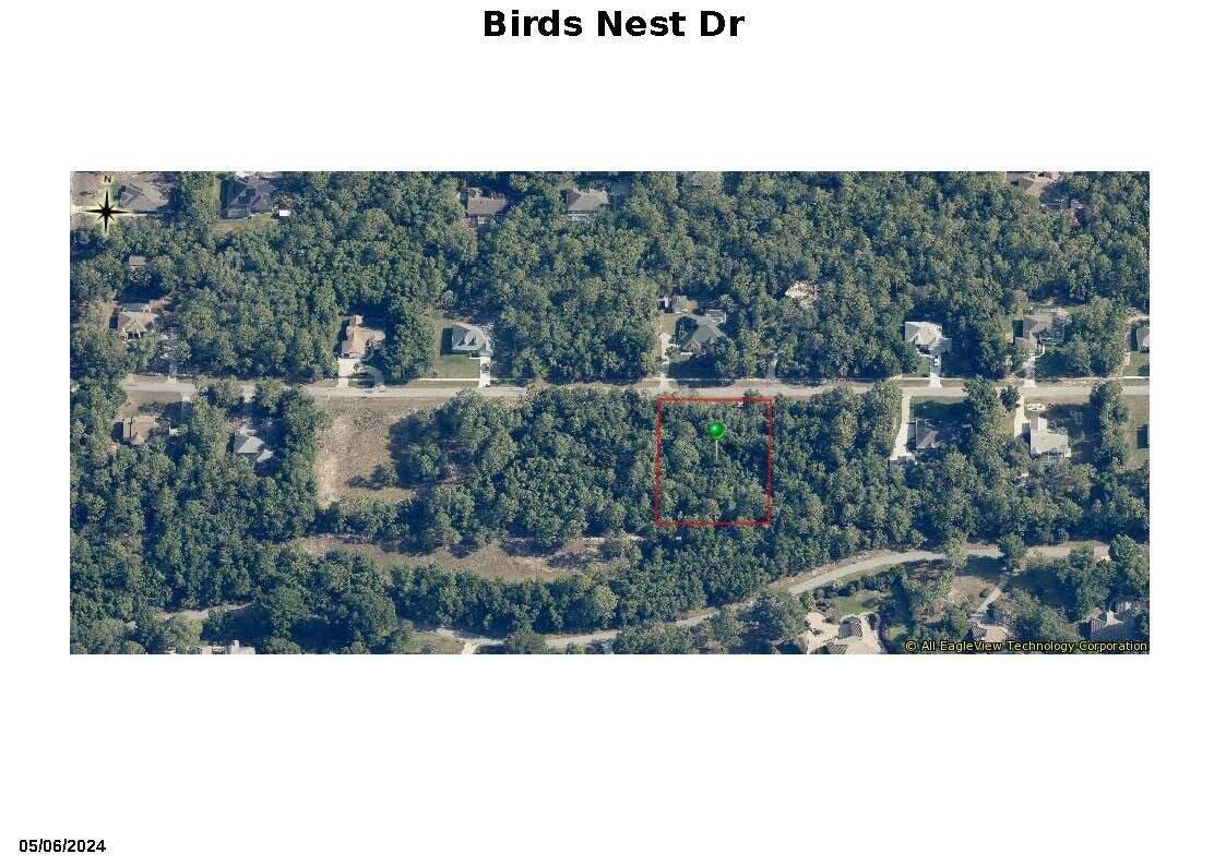 Beautiful 1 acre lot in great community of large homes. Lot backs up to golf course community. Per County Utilities it is septic and city water.