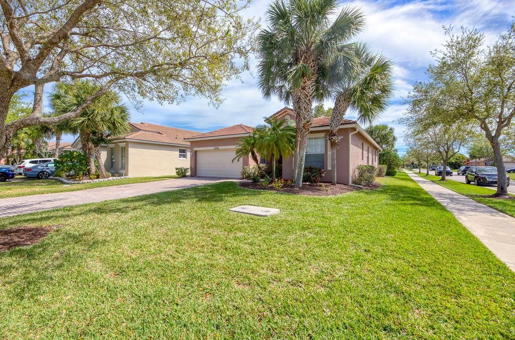 Photo of 9790 SW Lindale Trace Boulevard, Port Saint Lucie, FL 34987 (MLS # R11069446)