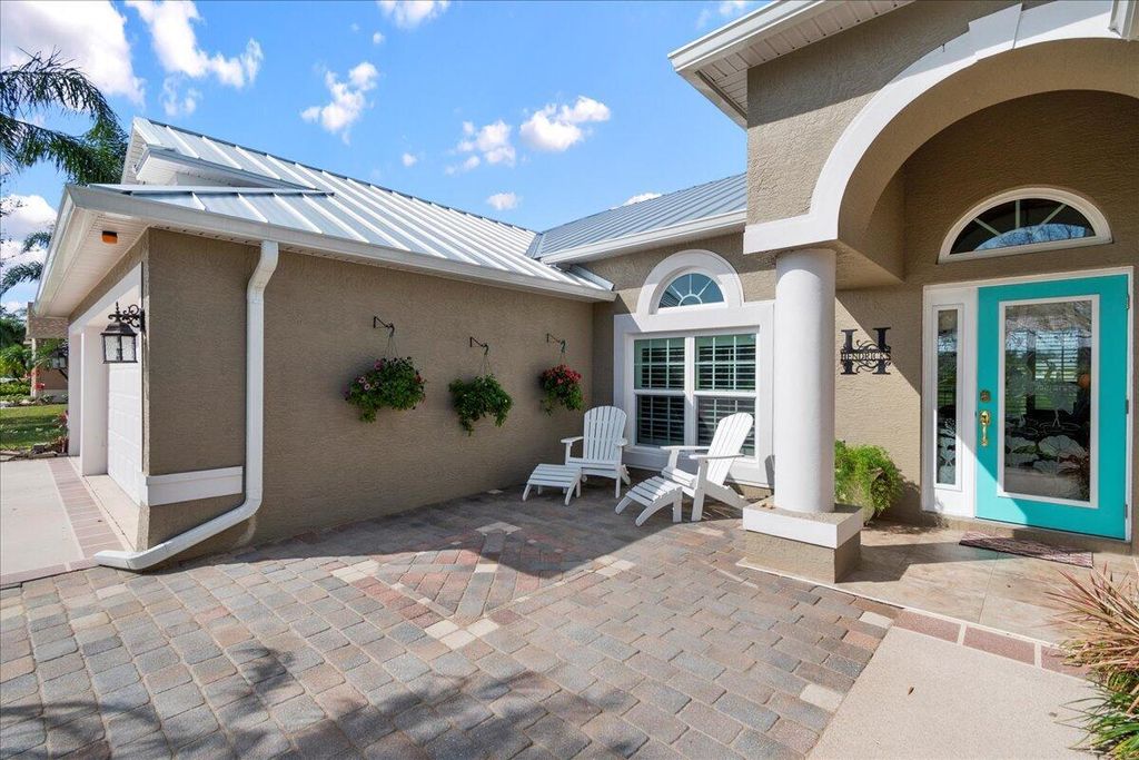 Photo of 2604 Palm Lakes Avenue, Fort Pierce, FL 34981 (MLS # R10952354)