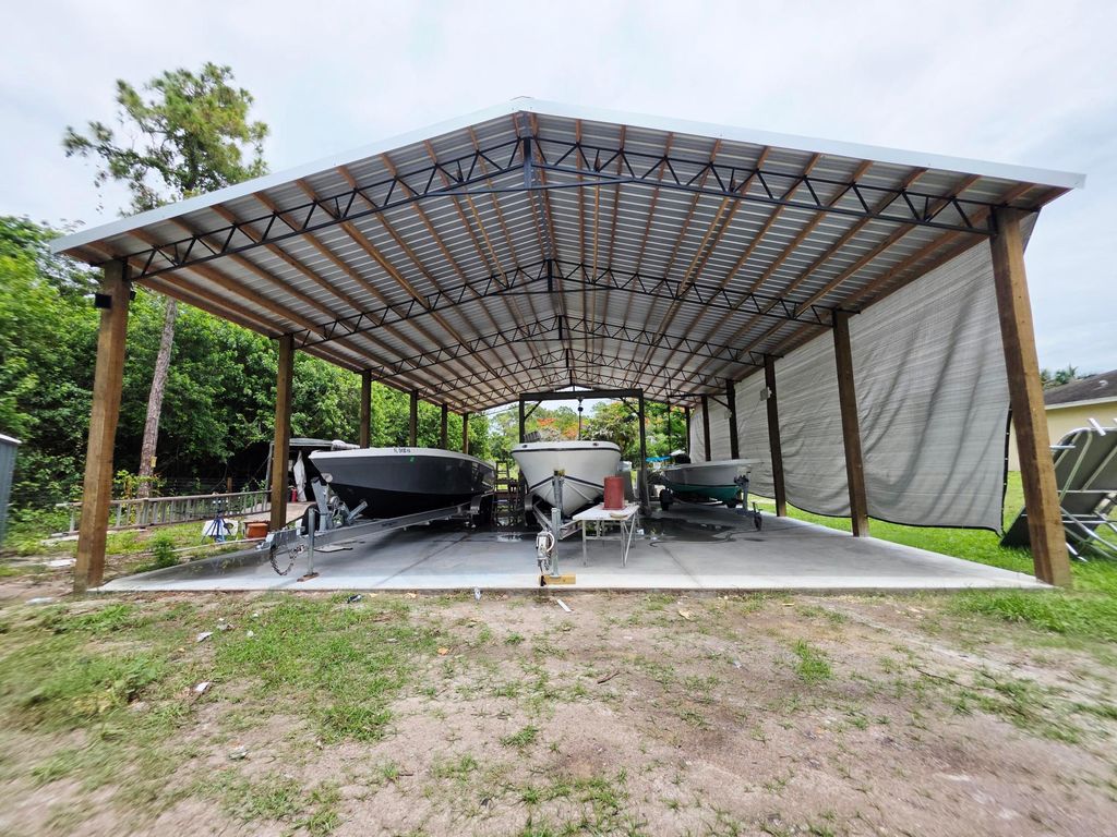 Photo of 17331 38th Road N, The Acreage, FL 33470 (MLS # B26035348)
