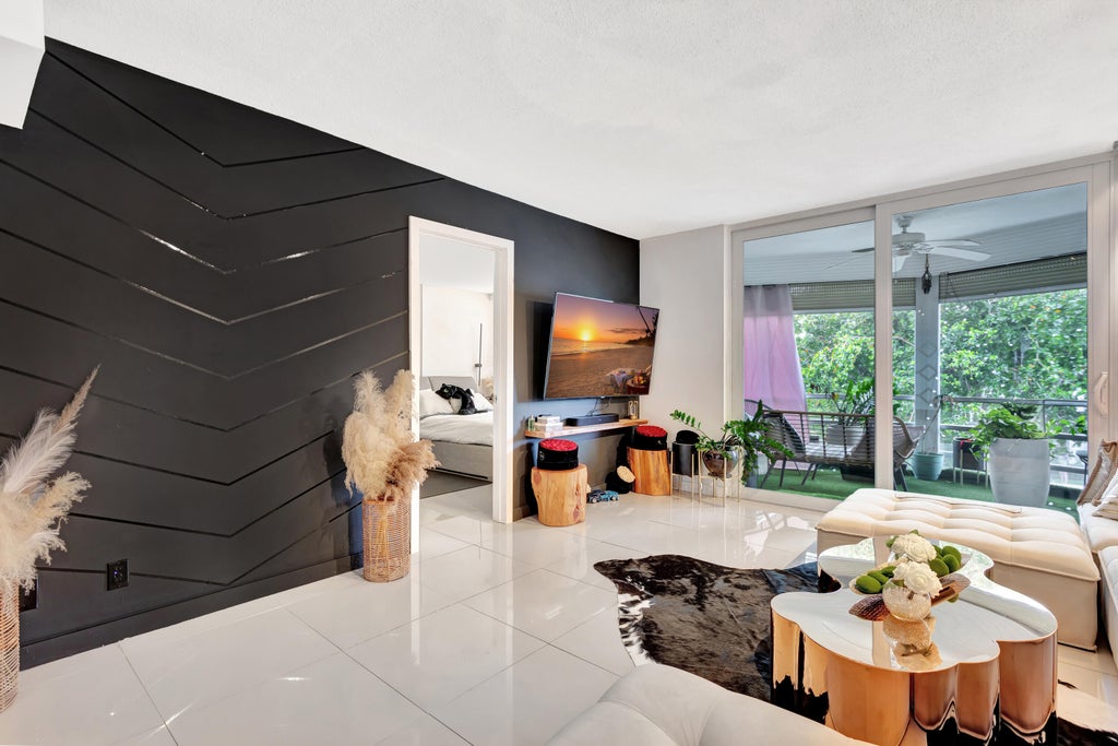 Photo of 400 SE 10TH Street #302, Deerfield Beach, FL 33441 (MLS # B26069656)