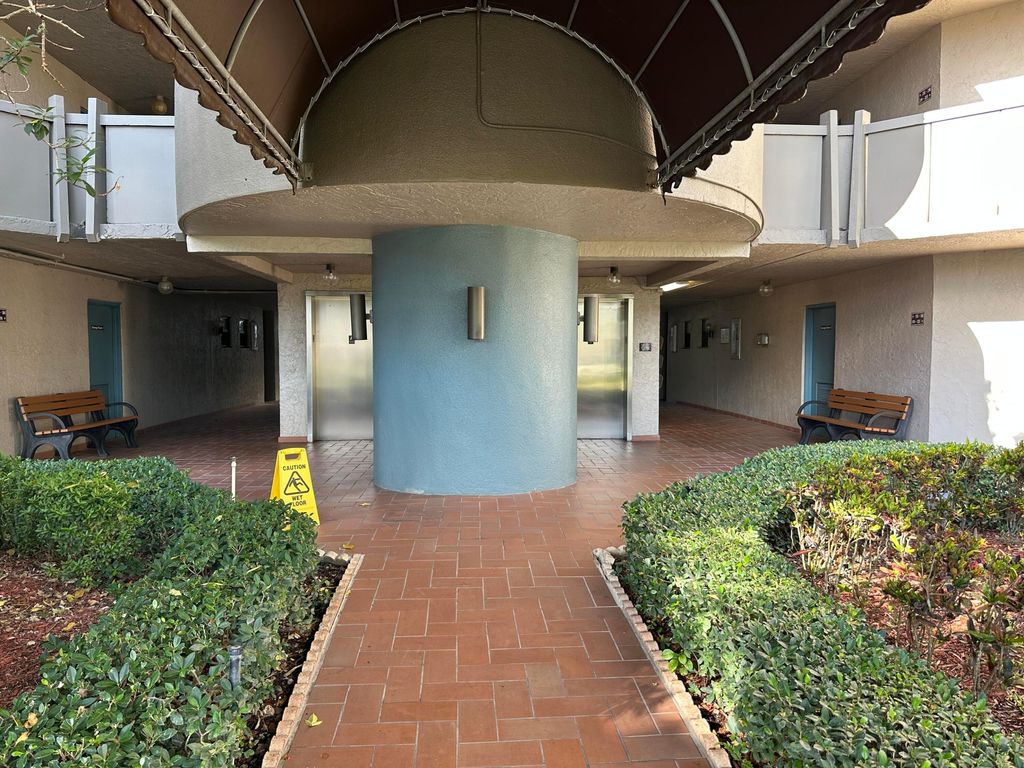Photo of 1101 Colony Point Circle #108, Pembroke Pines, FL 33026 (MLS # R11161391)